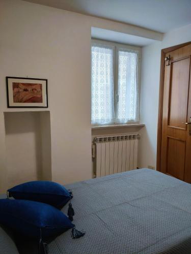 Postel nebo postele na pokoji v ubytování Casa Ludovici