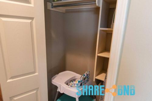 a childs bathroom with a toy toilet in a closet at Elegant Lakefront Home W Covered Patio in Little Rock