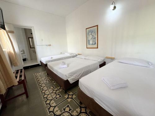 Hotel Casa Opiaにあるベッド