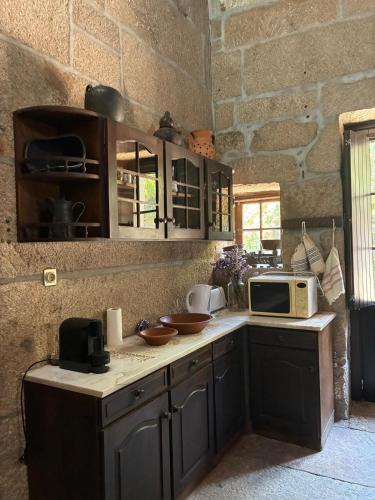 Η κουζίνα ή μικρή κουζίνα στο Casa do Vale de Cerva