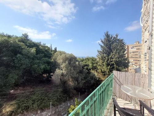 a view from the balcony of a building at Charming 2 BR Apt By The Foot Of The Bahai Temple in Haifa