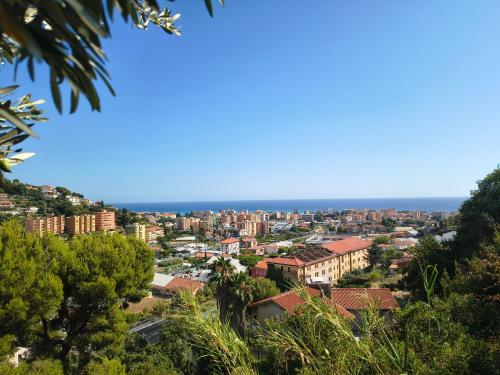 a view of the city from the hill at Casa indipendente Roque Vista al mar con parking gratuito in Vallecrosia