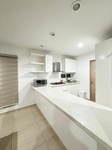 Kuchyň nebo kuchyňský kout v ubytování Almarena Residencial