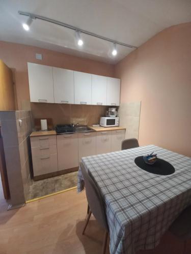 Kjøkken eller kjøkkenkrok på Pafi Apartment