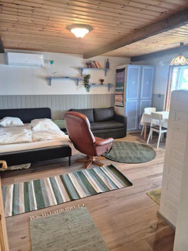 Кровать или кровати в номере Lehtiniemi Resort - Maria