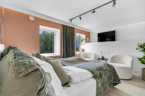 Postel nebo postele na pokoji v ubytování Bramy Apartments Retreat