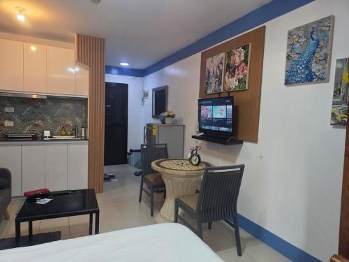 TV a/nebo společenská místnost v ubytování Saekyung Condo 109