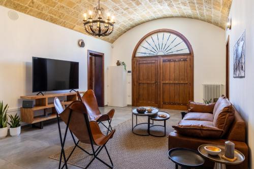 TV a/nebo společenská místnost v ubytování Villa Denu Salento - Intera Dimora con Piscina ad uso esclusivo