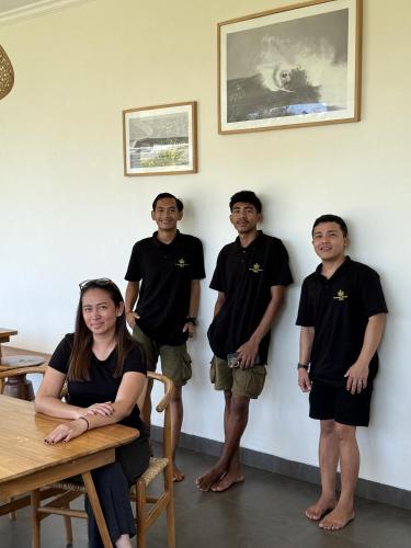 a group of people standing in a room at Tropical Almond Villa in Uluwatu