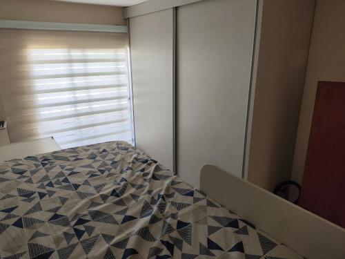 Voodi või voodid majutusasutuse Cobertura Pampulha toas