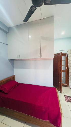 Una cama o camas en una habitación de Diya Apartment