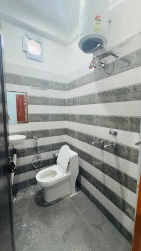 Un baño de Diya Apartment