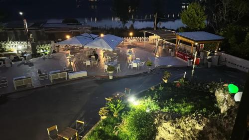 an aerial view of a restaurant at night at Avernum Relais Hotel e Ristorante in Pozzuoli