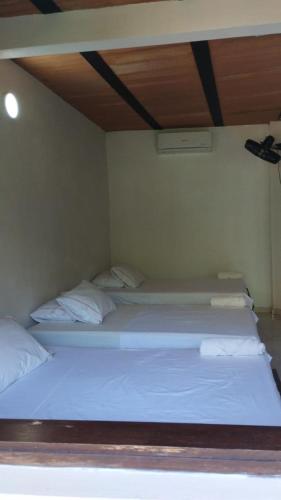 Cama o camas de una habitación en hotel bocas del cauca