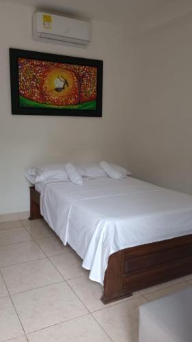 Cama o camas de una habitación en hotel bocas del cauca