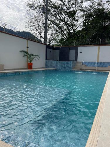 Piscina en o cerca de hotel bocas del cauca