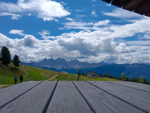 a view of the mountains from an airplane wing at Plose Appartements in Bressanone