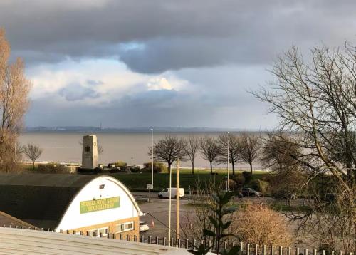 a building with a view of a body of water at 106 Brynmill - Room 7 in Sketty