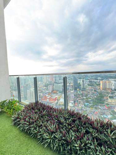 a view of a city from the top of a building at Luxe by KLCC in Gua Sai