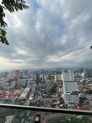a view of a city from the top of a building at Luxe by KLCC in Gua Sai