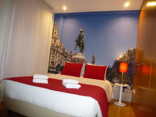 BRA.com Apartments Oporto Bonfimにあるベッド