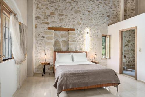 Ένα ή περισσότερα κρεβάτια σε δωμάτιο στο New Private Apartments by Myre3, just a short drive from Rethymno and the beach