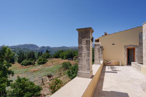 a view from the balcony of a house at New Private Apartments by Myre3, just a short drive from Rethymno and the beach in Zourídhion