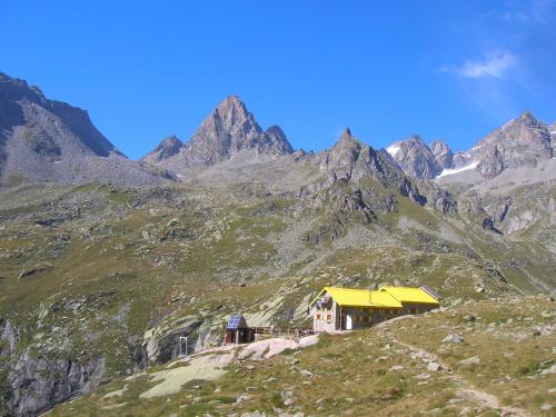 a building on the side of a mountain at BALMA DEI CUP con SPA privata su richiesta in Pont Canavese
