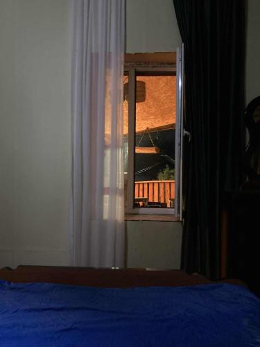 Un ou plusieurs lits dans un hébergement de l'établissement Dadu Guest house