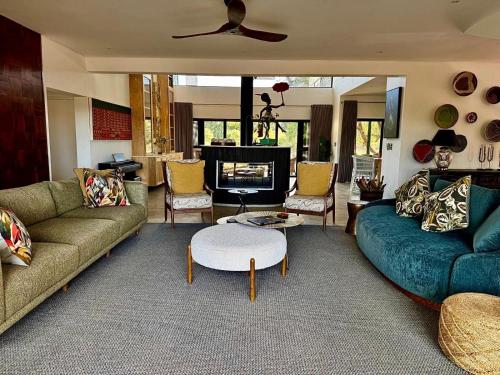 Posezení v ubytování Tapologo River Lodge