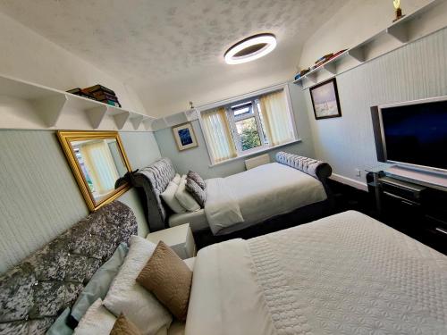 Ein Bett oder Betten in einem Zimmer der Unterkunft Clayton Home