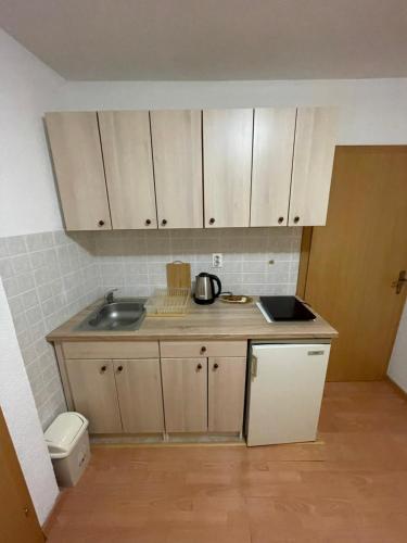 Η κουζίνα ή μικρή κουζίνα στο Apartmani Centar Fojnica