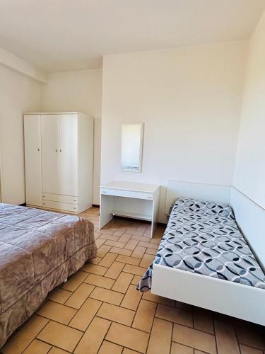 Katil atau katil-katil dalam bilik di APPARTAMENTO -C- VISTA MARE con 2 camere da letto-Residence Azzurro