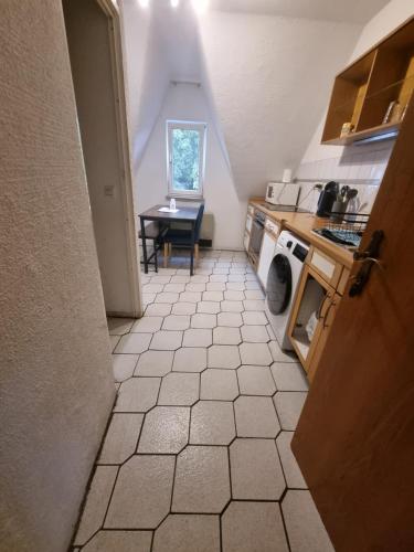 Kuchyň nebo kuchyňský kout v ubytování Monteurwohnung Erdgeschoss Birkenfeld - Karlsruhe 25min