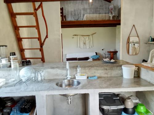Η κουζίνα ή μικρή κουζίνα στο Casa mahalo atalaia wi-fi