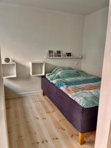 Lova arba lovos apgyvendinimo įstaigoje Cosy apartment