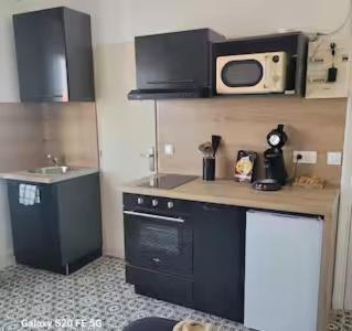 Η κουζίνα ή μικρή κουζίνα στο Au grain du nord