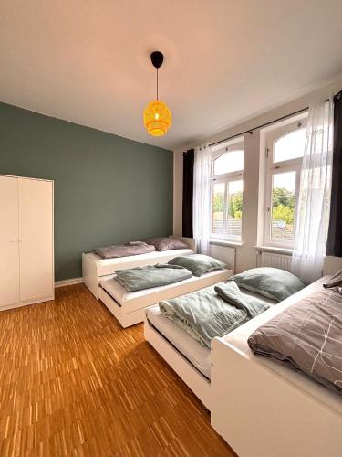 Postel nebo postele na pokoji v ubytování Apartment am Bergpark
