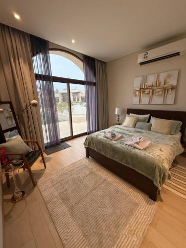 Postel nebo postele na pokoji v ubytování Ocean Star