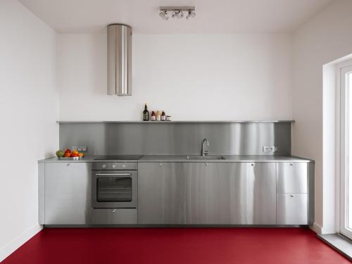 Kuchyň nebo kuchyňský kout v ubytování Numero cent