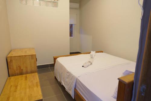 Postel nebo postele na pokoji v ubytování Sok Heng Guesthouse