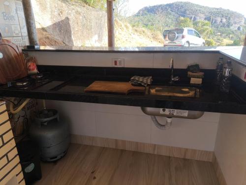 Küche/Küchenzeile in der Unterkunft Chalé Bela Vista