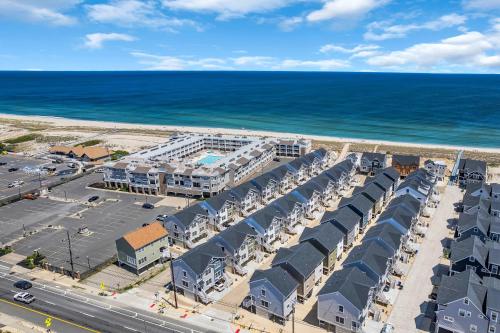 an aerial view of a resort next to the ocean at Private Beach Home in Mantoloking in Mantoloking