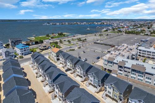an aerial view of a city and the water at Private Beach Home in Mantoloking in Mantoloking