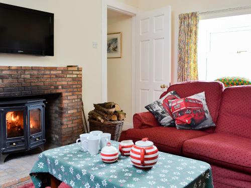 พื้นที่นั่งเล่นของ Inverchroskie Cottage