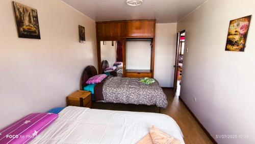 Ένα ή περισσότερα κρεβάτια σε δωμάτιο στο Casa Fabrizio Guest House