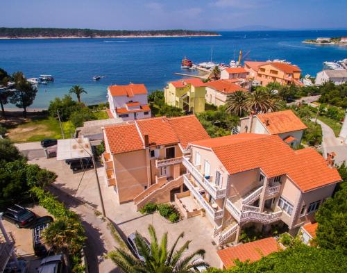 Apartments by the sea Banjol, Rab - 24825