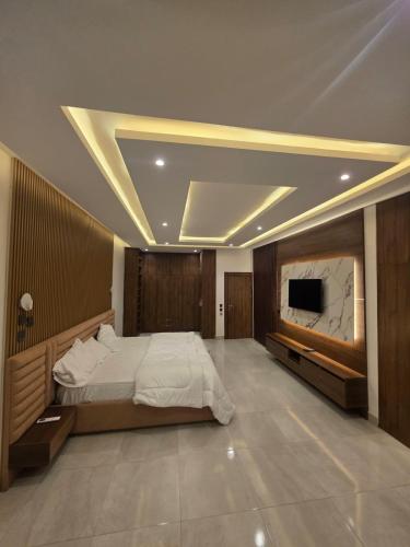 Cama o camas de una habitación en Sky Haven Apartment