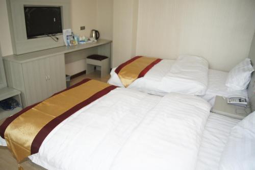 Postel nebo postele na pokoji v ubytování Juli Boutique Hotel