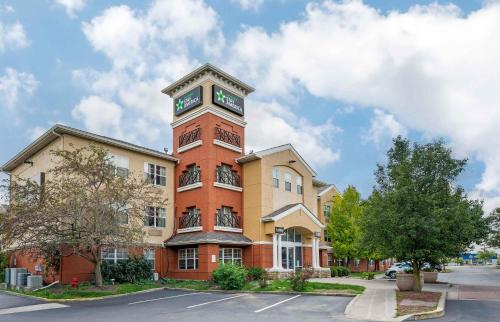 a building with a clock tower on top of it at Extended Stay America Suites - Indianapolis - Airport - W Southern Ave in Indianapolis